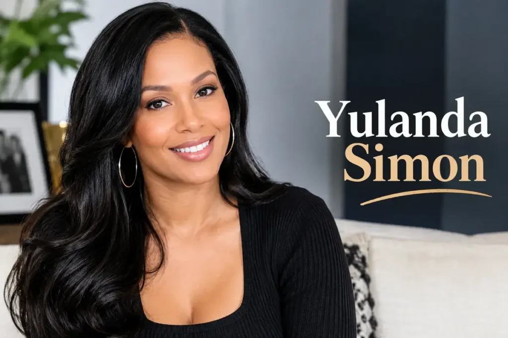 Yulanda Simon portrait with a stylish black outfit and elegant background